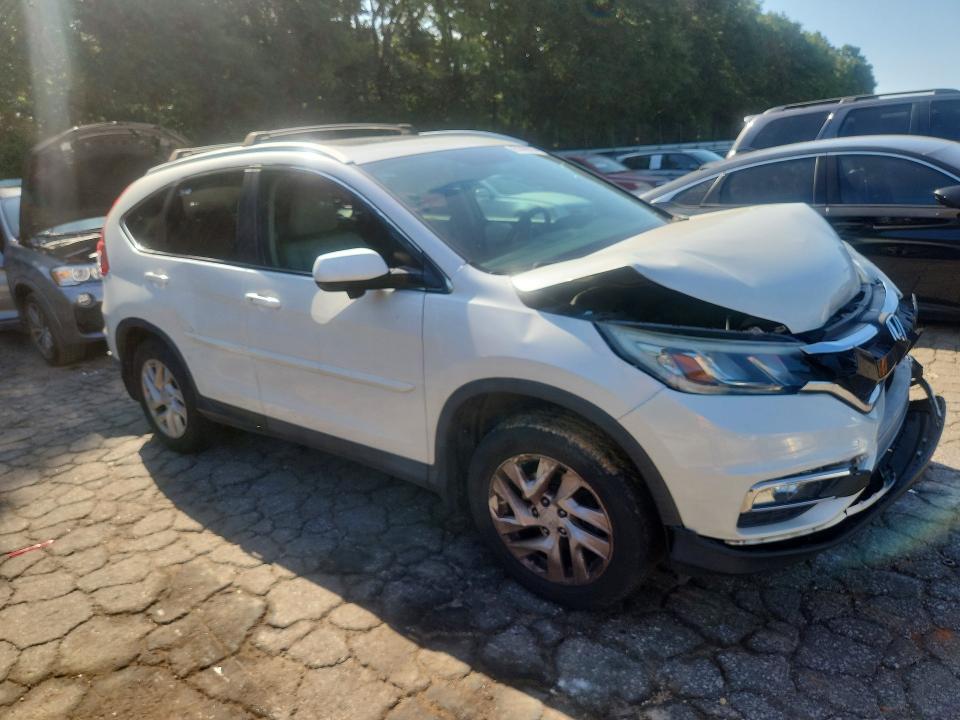 Photo 4 from auction – 2015 HONDA CR-V with VIN 5J6RM3H79FL010381