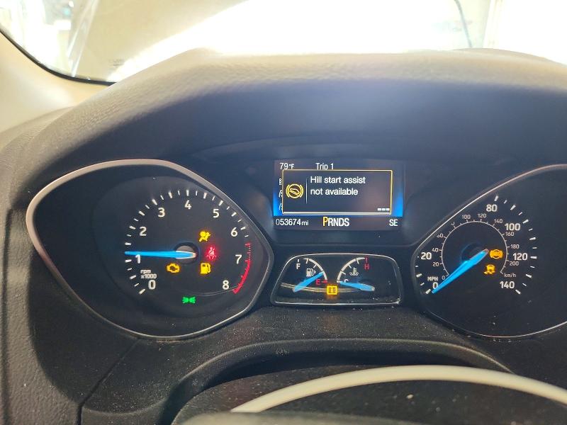 Photo 9 from auction – 2015 FORD FOCUS with VIN 1FADP3F2XFL255453