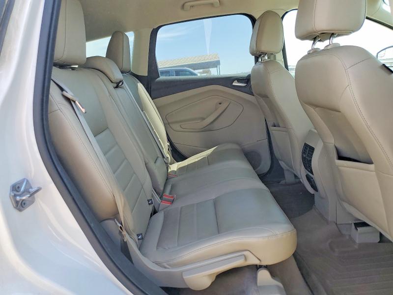 Photo 10 from auction – 2016 FORD ESCAPE with VIN 1FMCU0J99GUC59714
