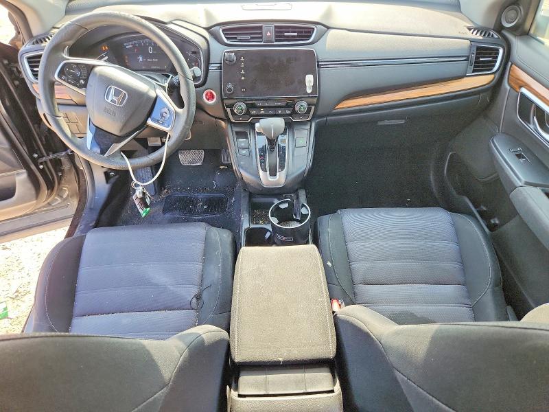 Photo 8 from auction – 2018 HONDA CR-V with VIN 7FARW2H57JE071088