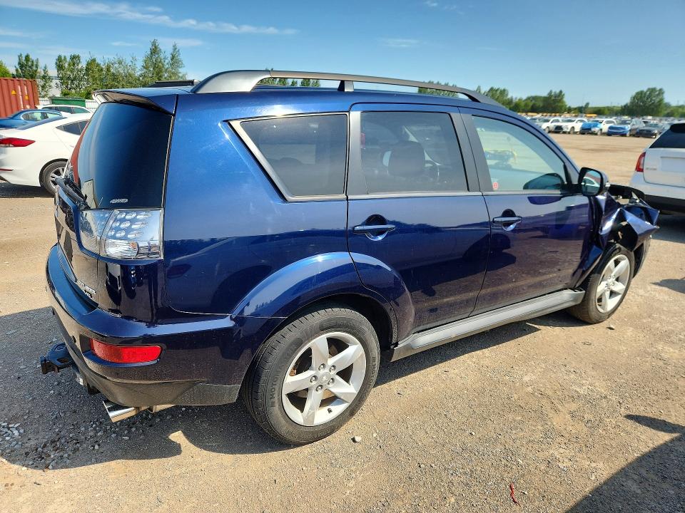 Photo 3 from auction – 2010 MITSUBISHI OUTLANDER with VIN JA4JT3AX0AZ608388