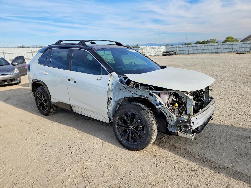 Photo 4 from auction – 2022 TOYOTA RAV4 with VIN 4T3E6RFV7NU092321