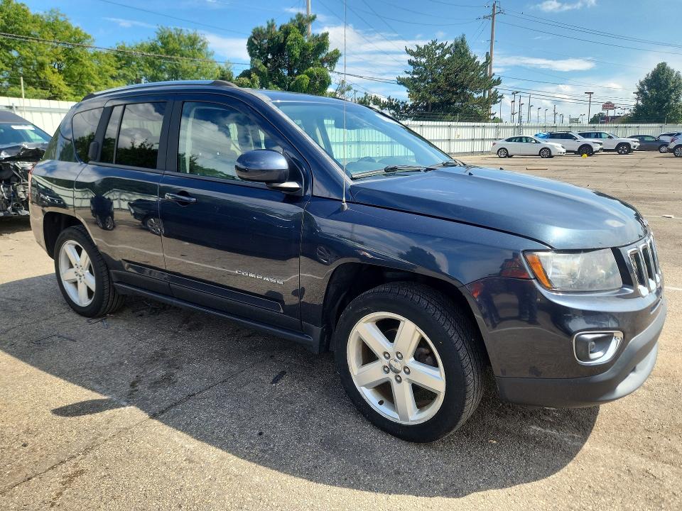 Photo 4 from auction – 2014 JEEP COMPASS with VIN 1C4NJCEA0ED889159