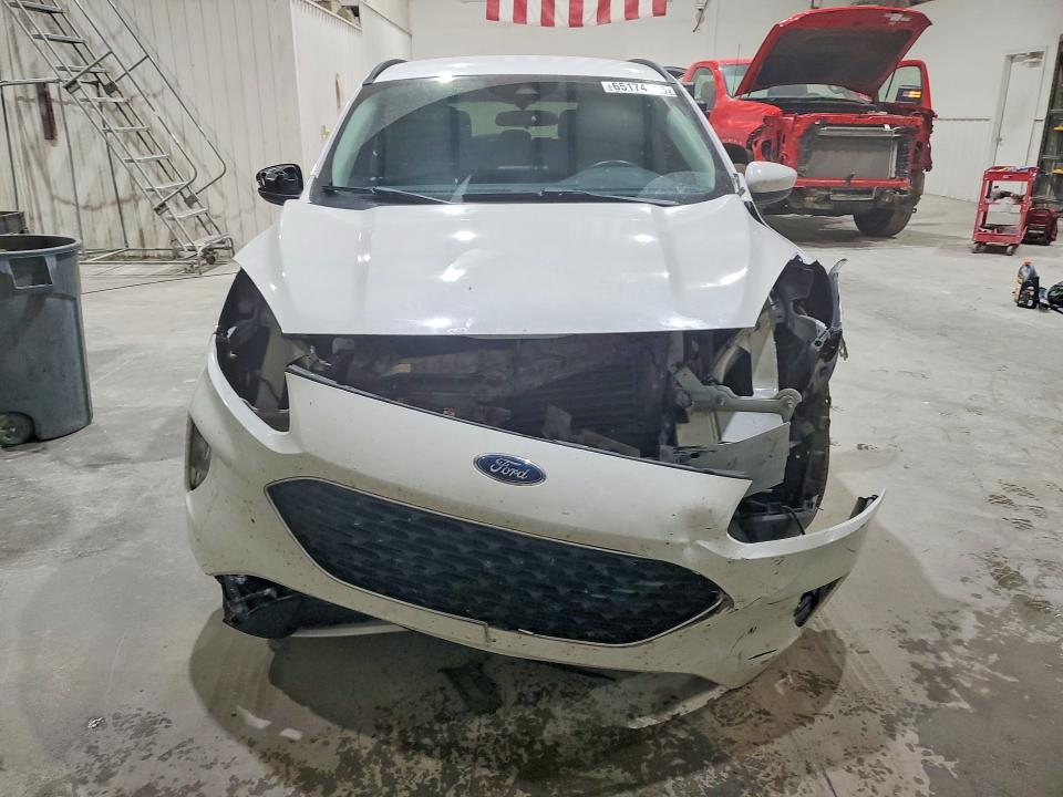 Photo 5 from auction – 2021 FORD ESCAPE with VIN 1FMCU0H65MUA10303