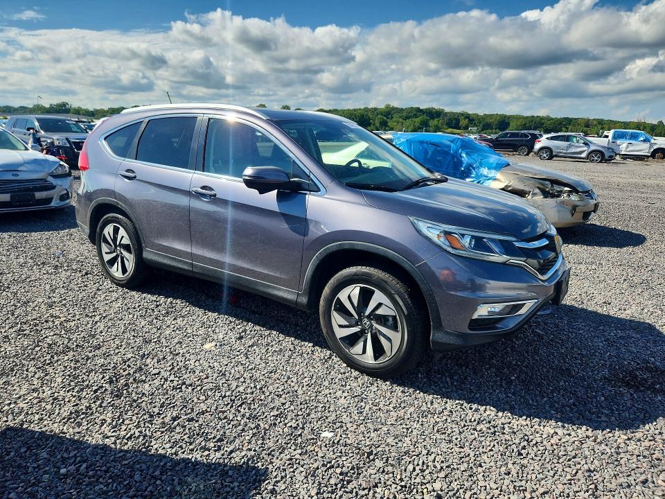 Photo 4 from auction – 2016 HONDA CR-V with VIN 5J6RM4H97GL071785