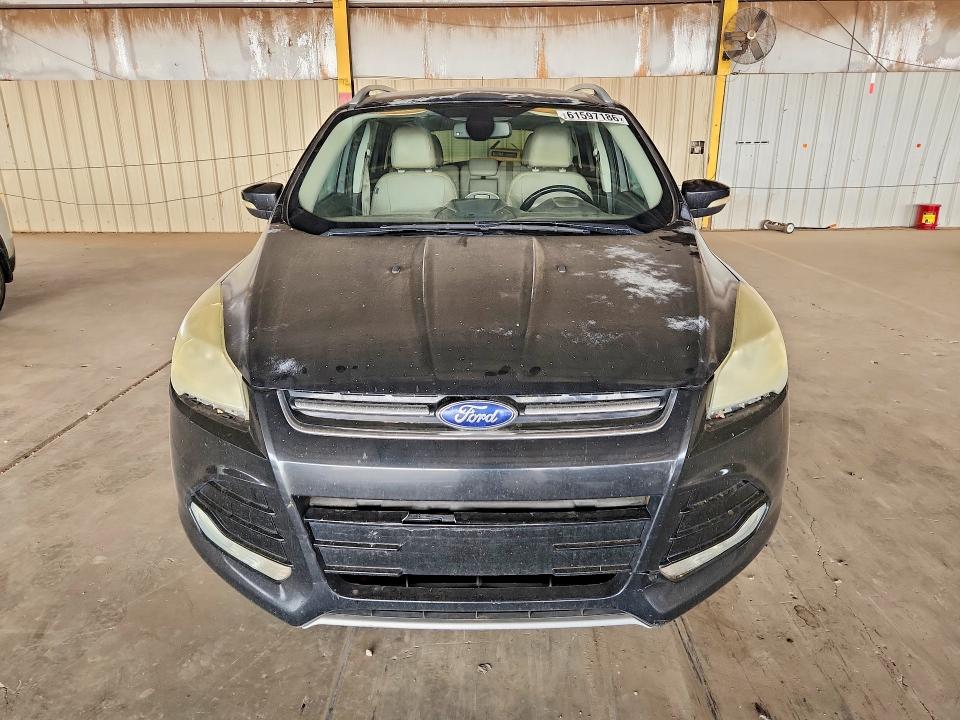 Photo 5 from auction – 2014 FORD ESCAPE with VIN 1FMCU0J97EUC85421