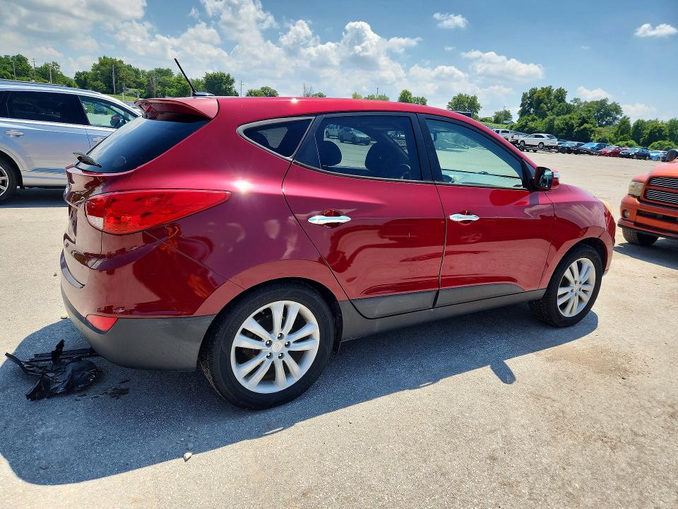 Photo 3 from auction – 2013 HYUNDAI TUCSON with VIN KM8JUCAC5DU712808