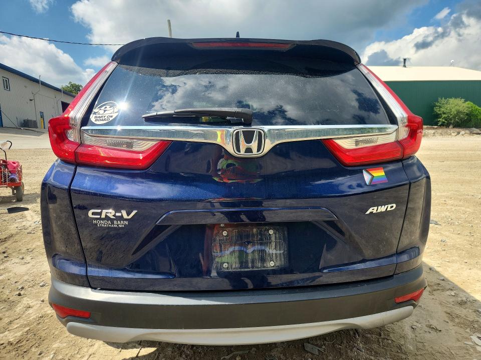 Photo 6 from auction – 2018 HONDA CR-V with VIN 7FARW2H55JE082350