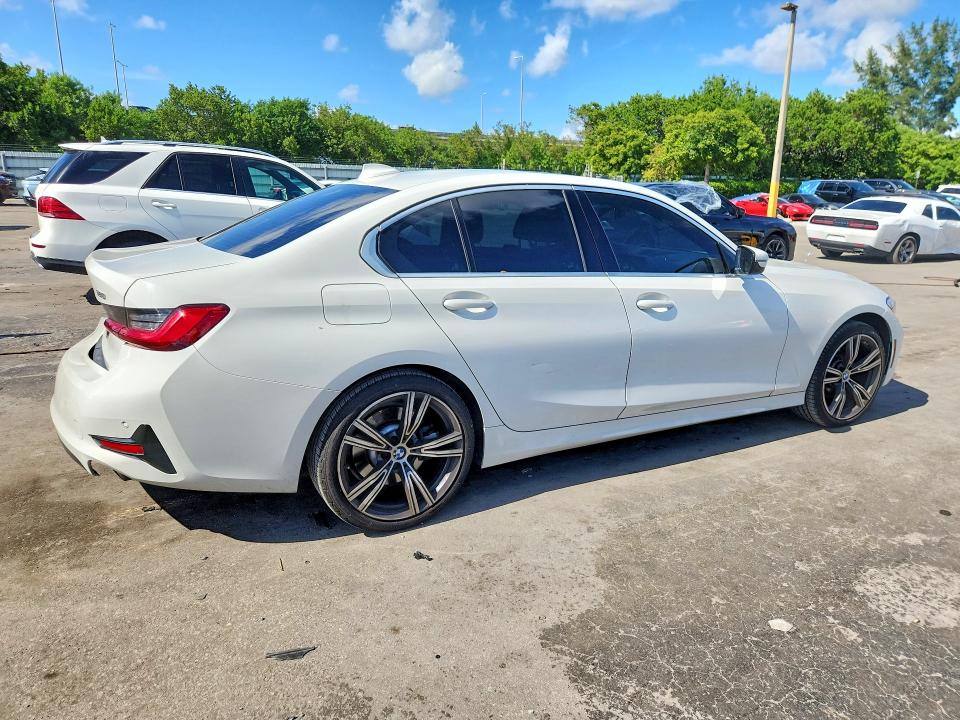 Photo 3 from auction – 2021 BMW 330I with VIN 3MW5R1J00M8B59206