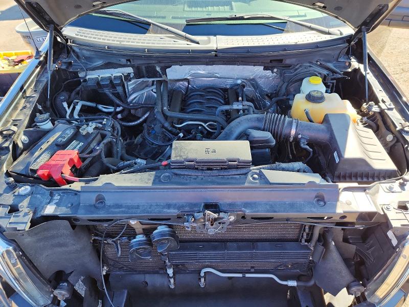 Photo 11 from auction – 2014 FORD F150 with VIN 1FTFW1EFXEKF14073