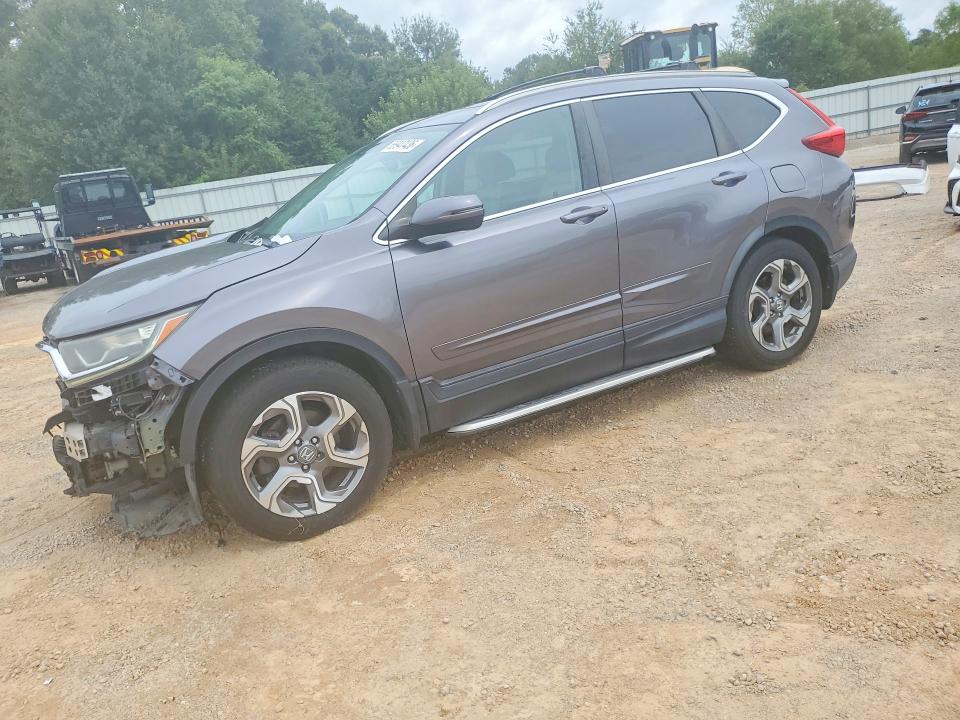 Photo 1 from auction – 2017 HONDA CR-V with VIN 7FARW1H80HE005044