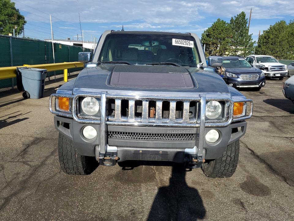 Photo 5 from auction – 2006 HUMMER H3 with VIN 5GTDN136568323584