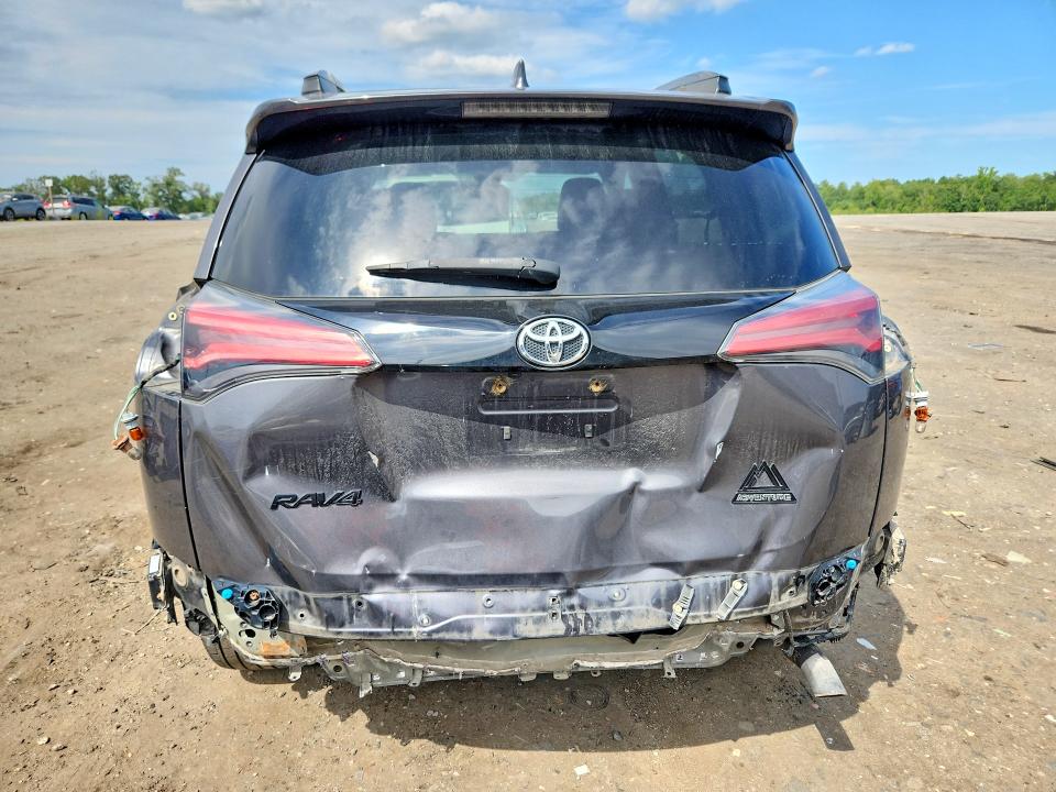Photo 6 from auction – 2018 TOYOTA RAV4 with VIN 2T3RFREV7JW701940