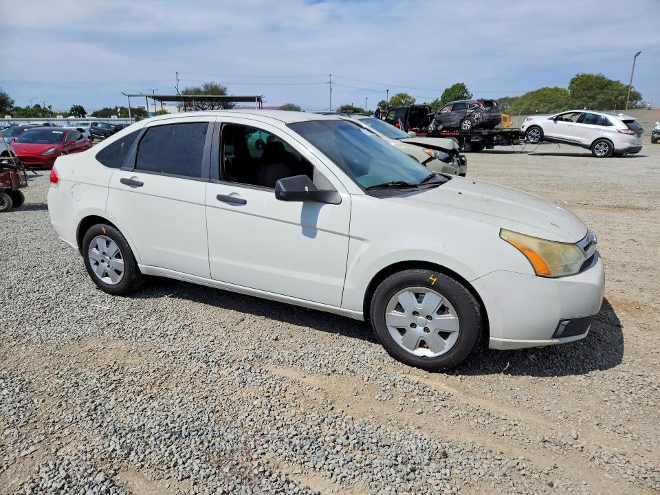 Снимка 4 от търг – 2011 FORD FOCUS с VIN 1FAHP3EN7BW103765