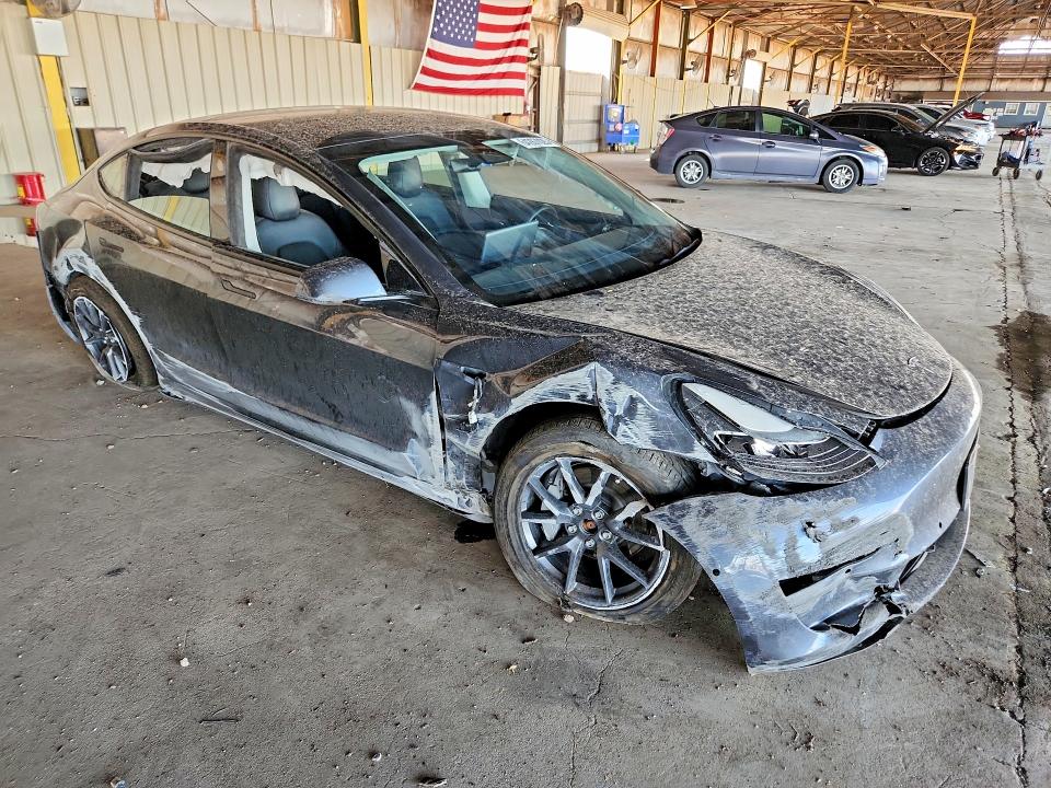 Photo 4 from auction – 2022 TESLA MODEL 3 with VIN 5YJ3E1EB2NF130742