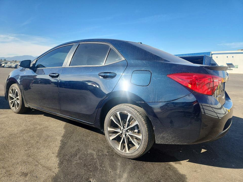 Photo 2 from auction – 2018 TOYOTA COROLLA with VIN 5YFBURHE9JP766804