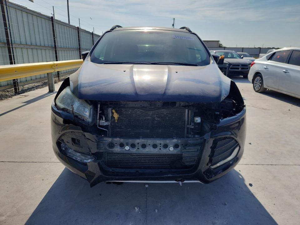 Photo 5 from auction – 2016 FORD ESCAPE with VIN 1FMCU0G9XGUA00107