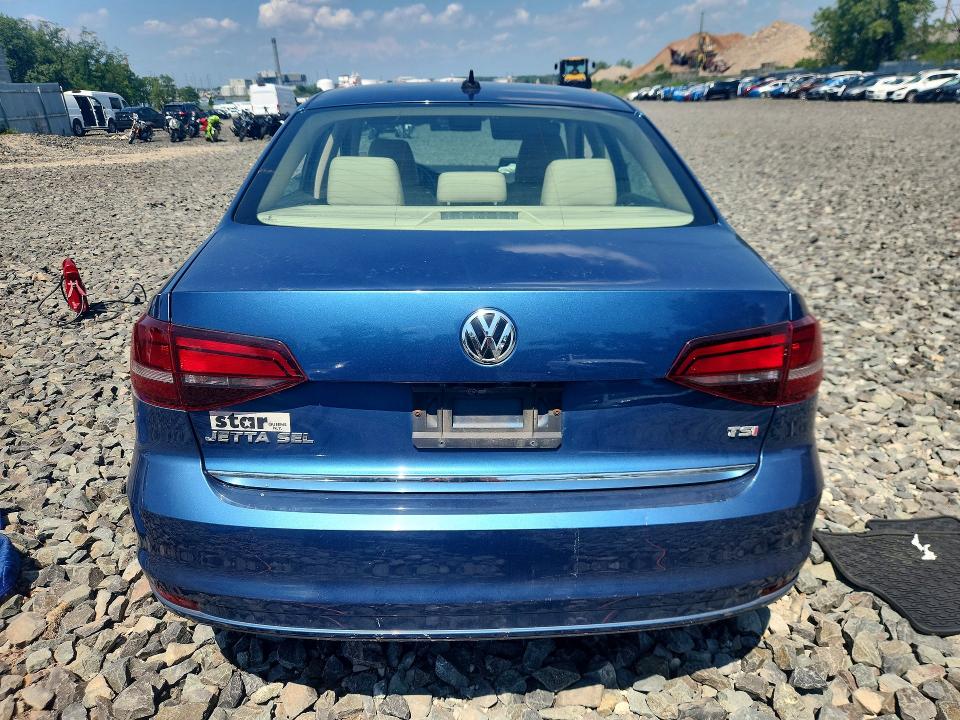 Photo 6 from auction – 2017 VOLKSWAGEN JETTA with VIN 3VWL17AJ4HM410980