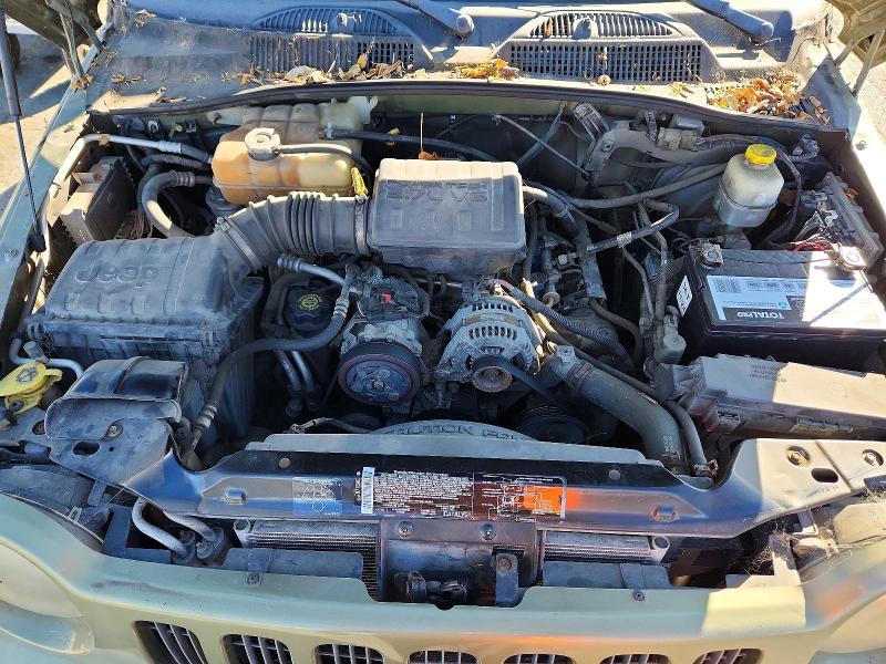 Photo 11 from auction – 2003 JEEP LIBERTY with VIN 1J4GL38K13W554382