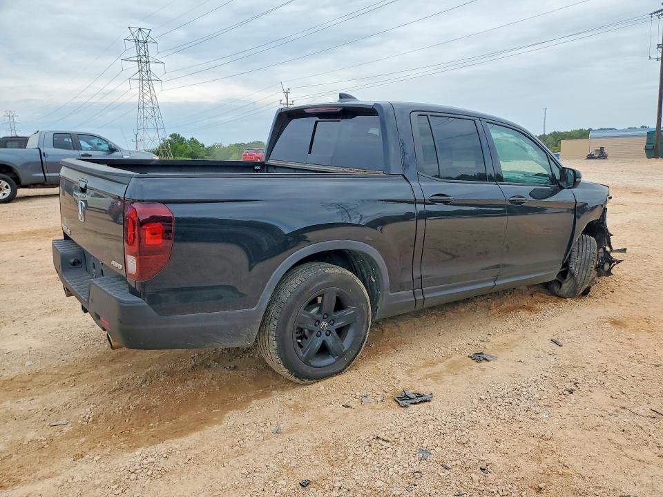 Photo 3 from auction – 2023 HONDA RIDGELINE with VIN 5FPYK3F83PB026154