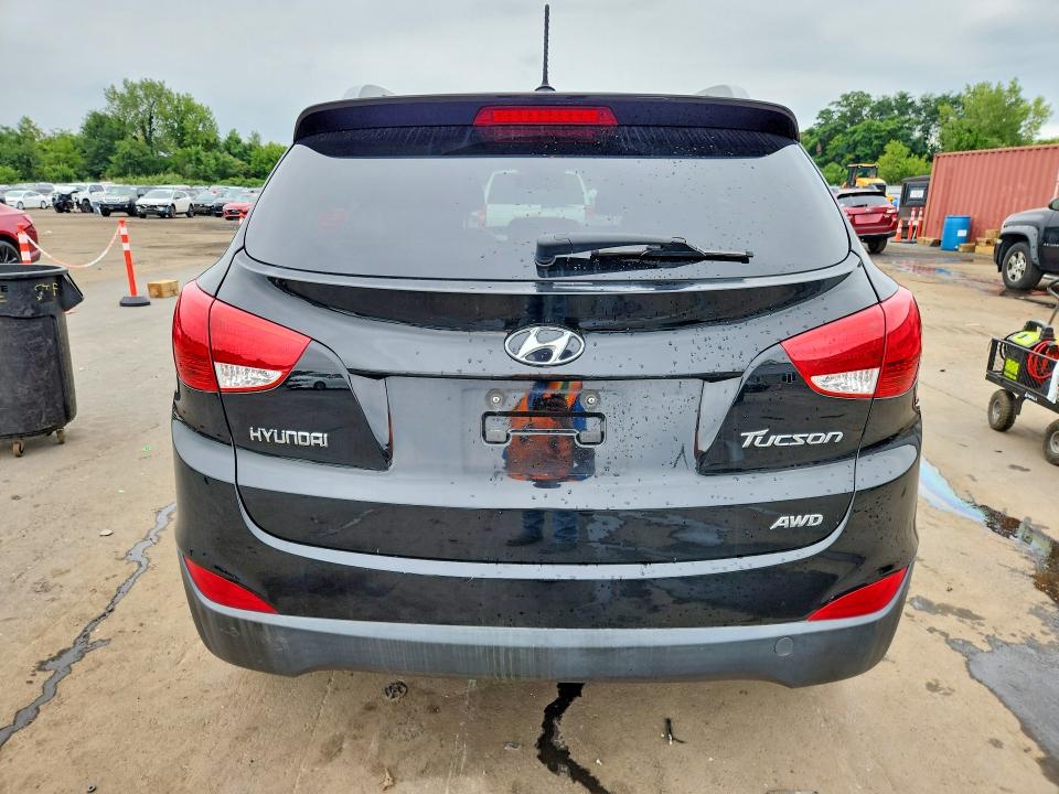 Photo 6 from auction – 2012 HYUNDAI TUCSON with VIN KM8JUCAC4CU419478