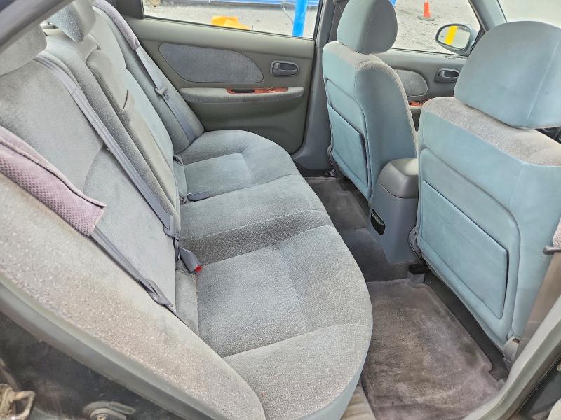 Photo 10 from auction – 2002 KIA OPTIMA with VIN KNAGD128125114426