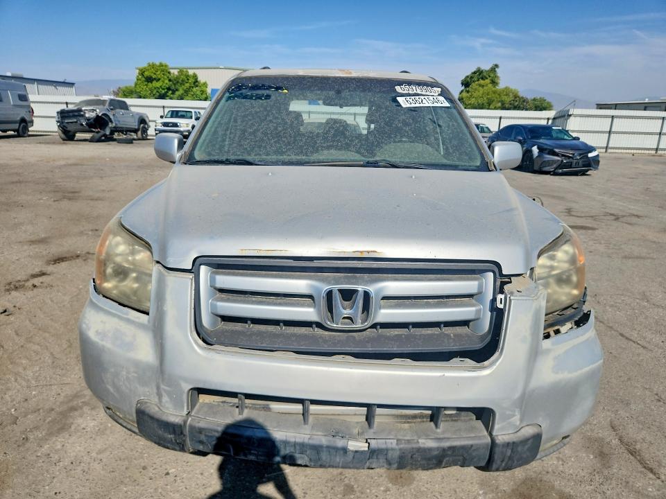 Photo 5 from auction – 2006 HONDA PILOT with VIN 5FNYF28786B052100