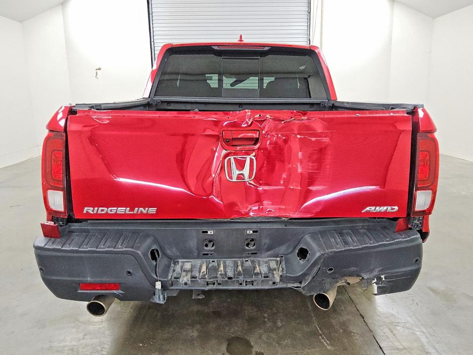 Photo 6 from auction – 2023 HONDA RIDGELINE with VIN 5FPYK3F79PB007597