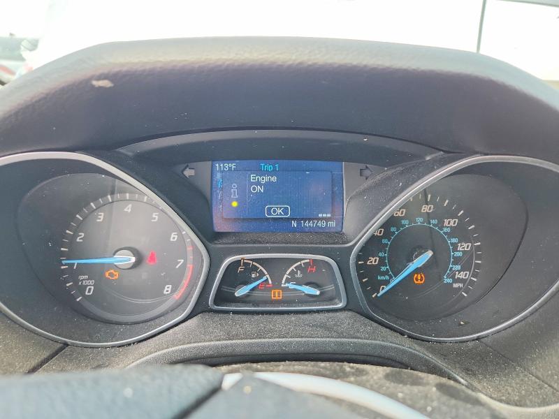 Photo 9 from auction – 2014 FORD FOCUS with VIN 1FADP3F28EL318483