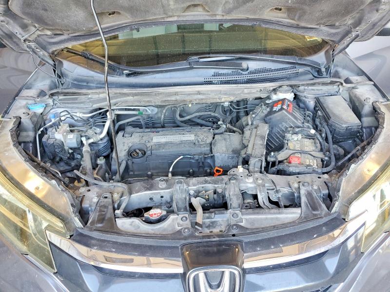 Photo 12 from auction – 2015 HONDA CR-V with VIN 5J6RM4H32FL094191