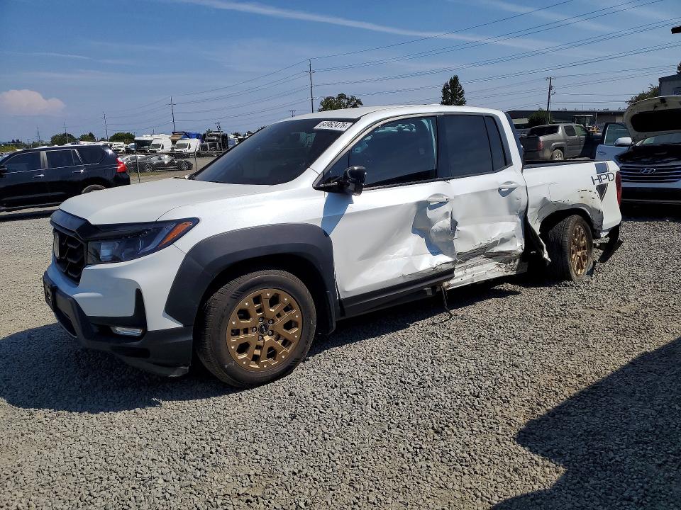 HONDA RIDGELINE 2022 with VIN 5FPYK3F18NB013352 - Photo from auction