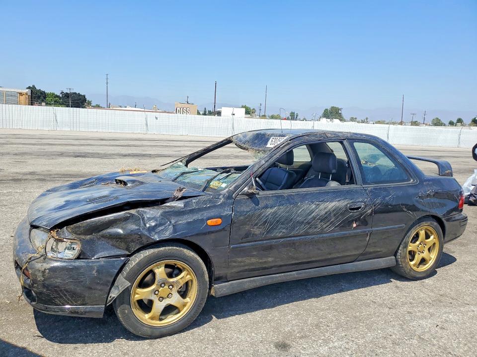 SUBARU IMPREZA 1998 with VIN JF1GM6751WH402231 - Photo from auction