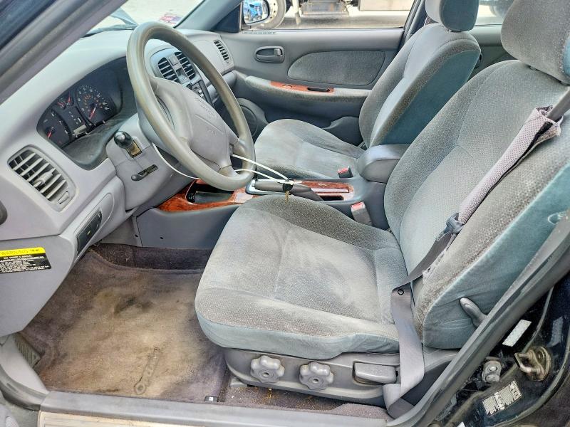 Photo 7 from auction – 2002 KIA OPTIMA with VIN KNAGD128125114426