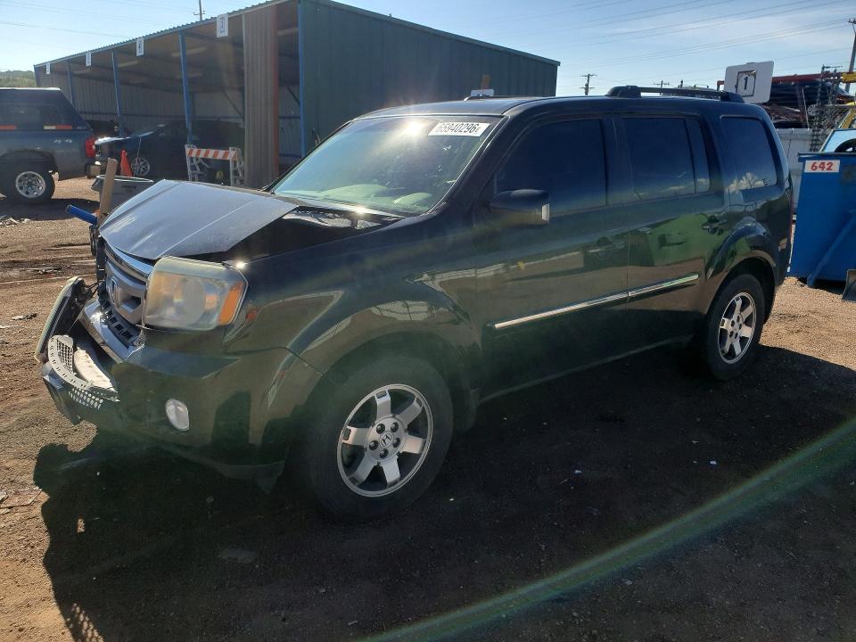 HONDA PILOT 2011 with VIN 5FNYF4H95BB080962 - Photo from auction