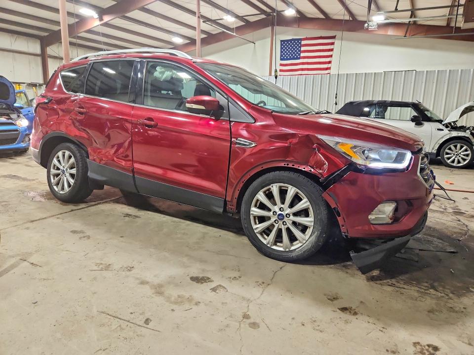 Photo 4 from auction – 2017 FORD ESCAPE with VIN 1FMCU9J92HUB91052