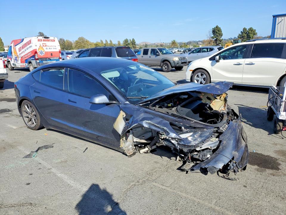 Photo 4 from auction – 2022 TESLA MODEL 3 with VIN 5YJ3E1EA4NF192876