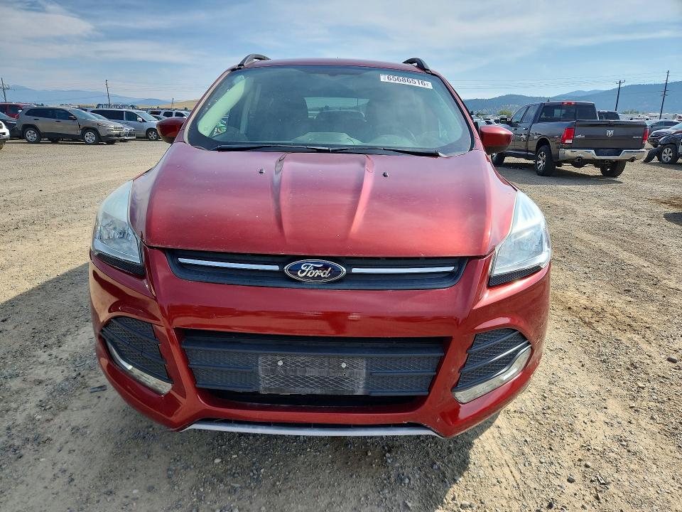 Photo 5 from auction – 2015 FORD ESCAPE with VIN 1FMCU9G99FUC27405