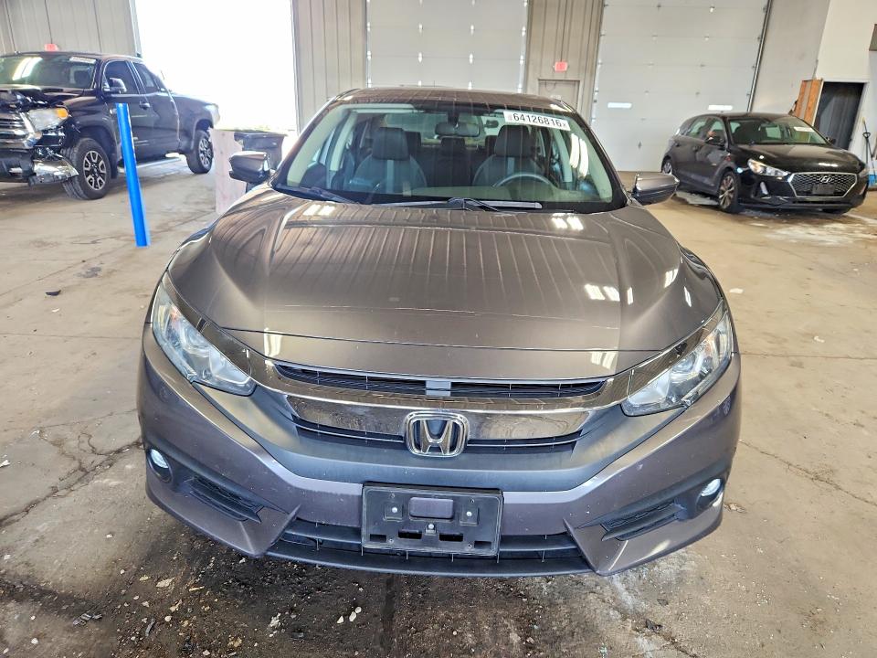Photo 5 from auction – 2016 HONDA CIVIC with VIN 19XFC1F39GE013789