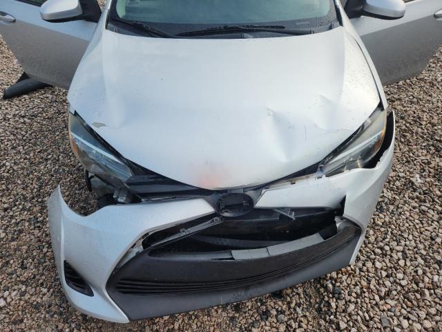 Photo 11 from auction – 2018 TOYOTA COROLLA with VIN 5YFBURHEXJP855653