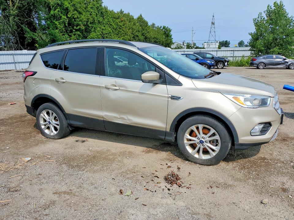 Photo 4 from auction – 2018 FORD ESCAPE with VIN 1FMCU9GD4JUA32860
