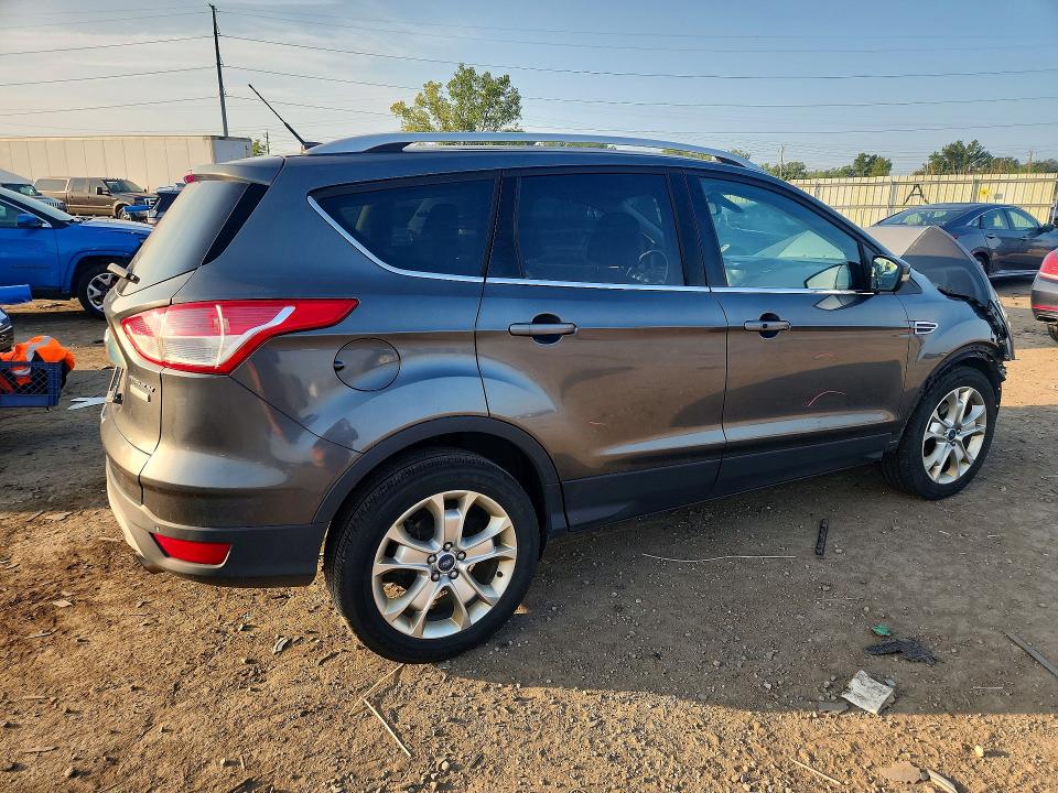 Photo 3 from auction – 2016 FORD ESCAPE with VIN 1FMCU0JX2GUC24432