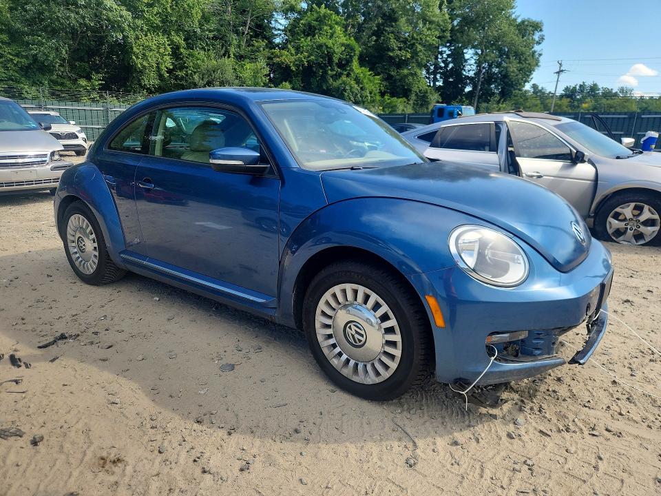 Photo 4 from auction – 2016 VOLKSWAGEN BEETLE with VIN 3VWJ17AT7GM635353