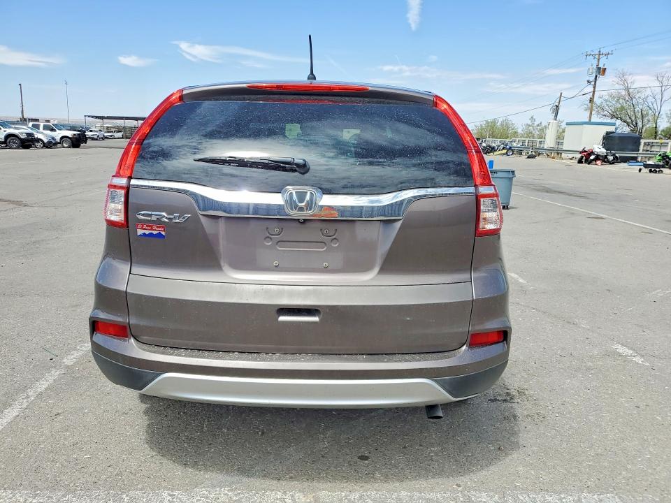 Photo 6 from auction – 2015 HONDA CR-V with VIN 2HKRM3H53FH526955