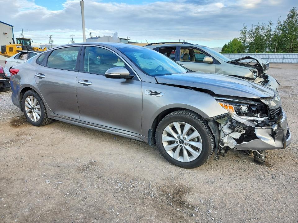 Photo 4 from auction – 2018 KIA OPTIMA with VIN 5XXGT4L34JG229719
