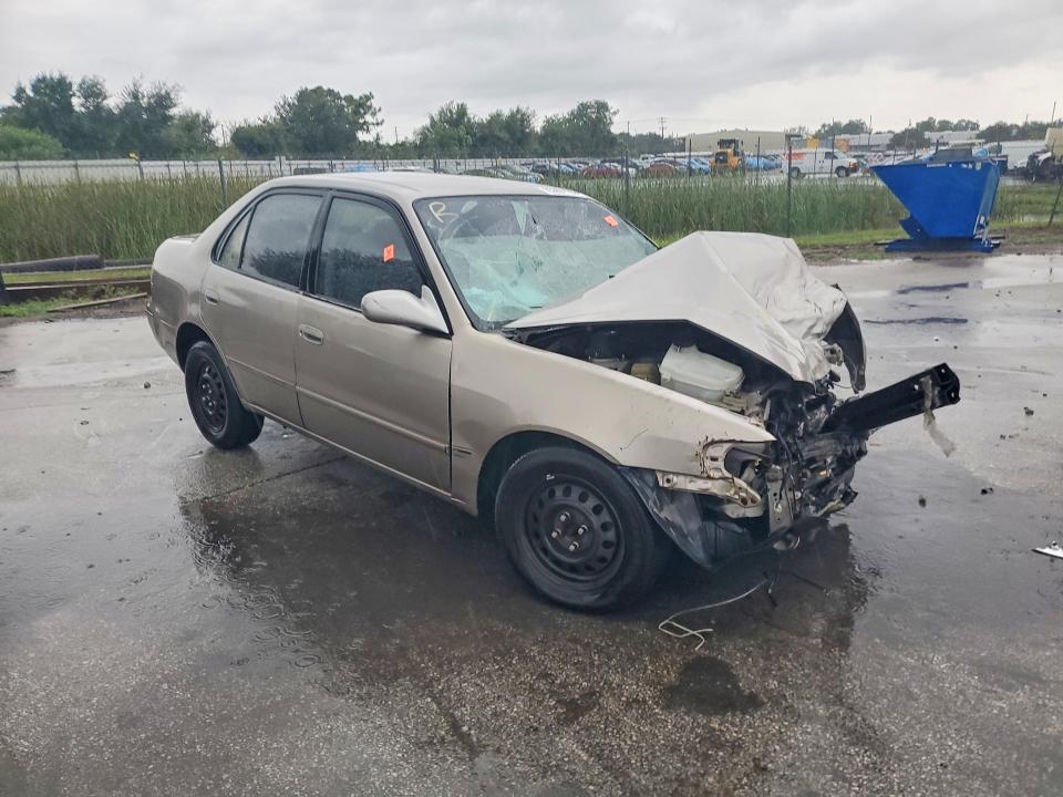 Photo 4 from auction – 2001 TOYOTA COROLLA with VIN 2T1BR12EX1C411443