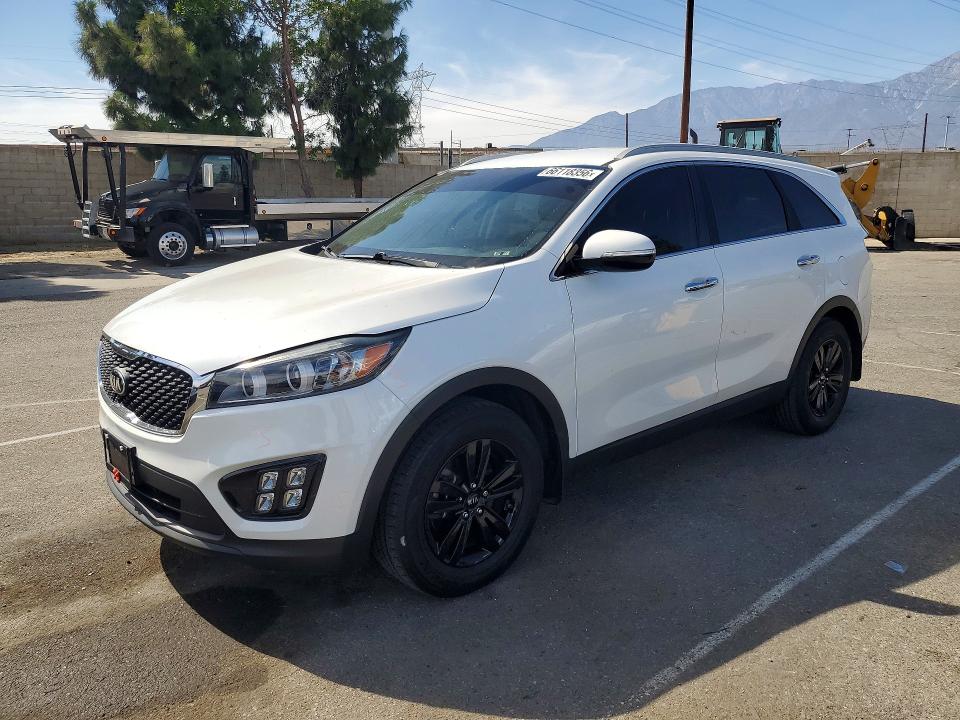 KIA SORENTO 2016 with VIN 5XYPG4A3XGG173006 - Photo from auction