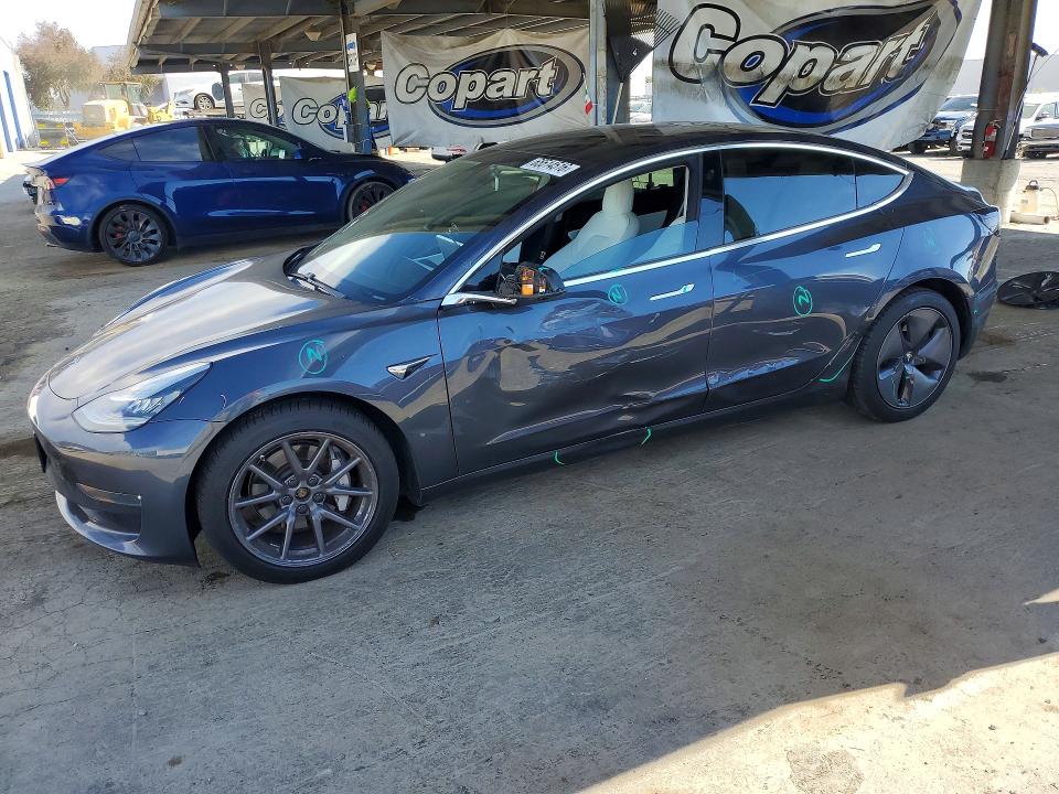 TESLA MODEL 3 2020 with VIN 5YJ3E1EBXLF651351 - Photo from auction
