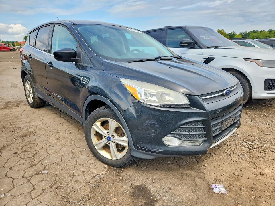 Photo 4 from auction – 2014 FORD ESCAPE with VIN 1FMCU0GX4EUB20593