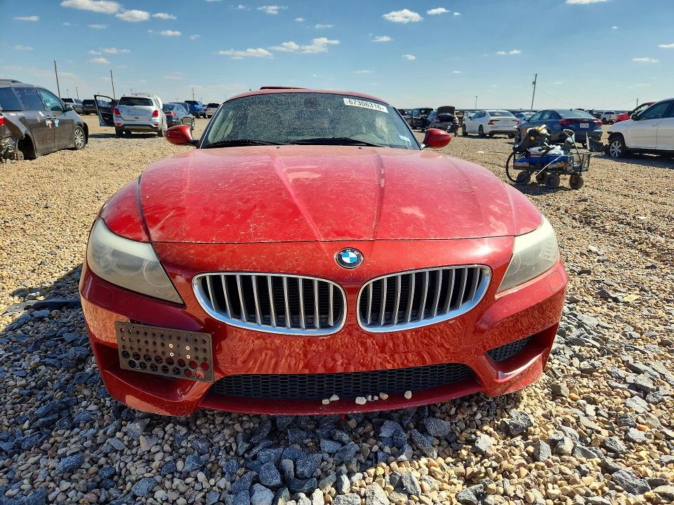 Photo 5 from auction – 2011 BMW Z4 with VIN WBALM7C59BE382713