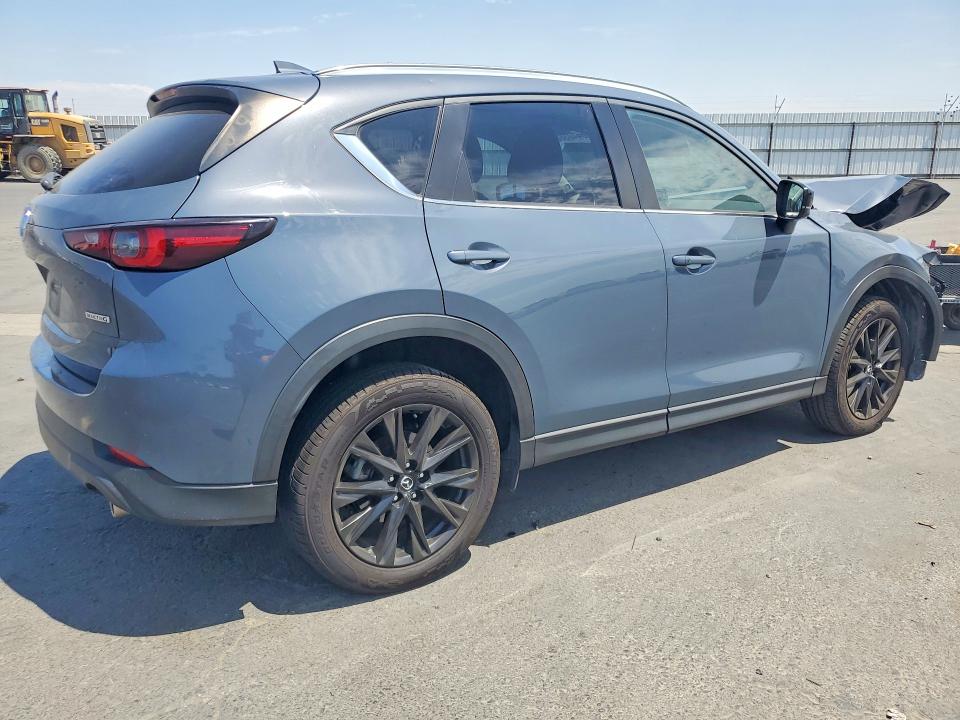 Photo 3 from auction – 2023 MAZDA CX-5 with VIN JM3KFBCM6P0129850